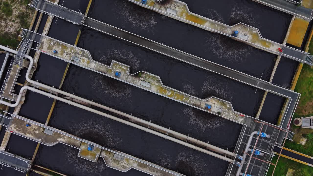 Water treatment facility shows tanks and pipelines in operation