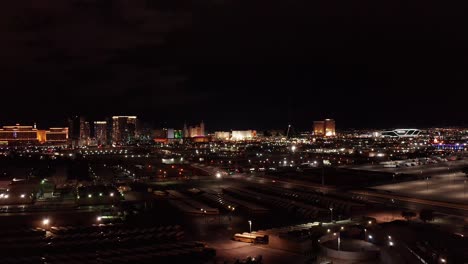 aerial wide rising shot of the south las vegas strip at night