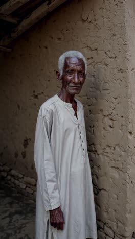 elderly man in traditional clothing