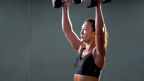 in front of muscular sportswoman sportswear bodybuilder weightlifter with an ideal body, after coaching poses, abdominal muscles, biceps triceps.