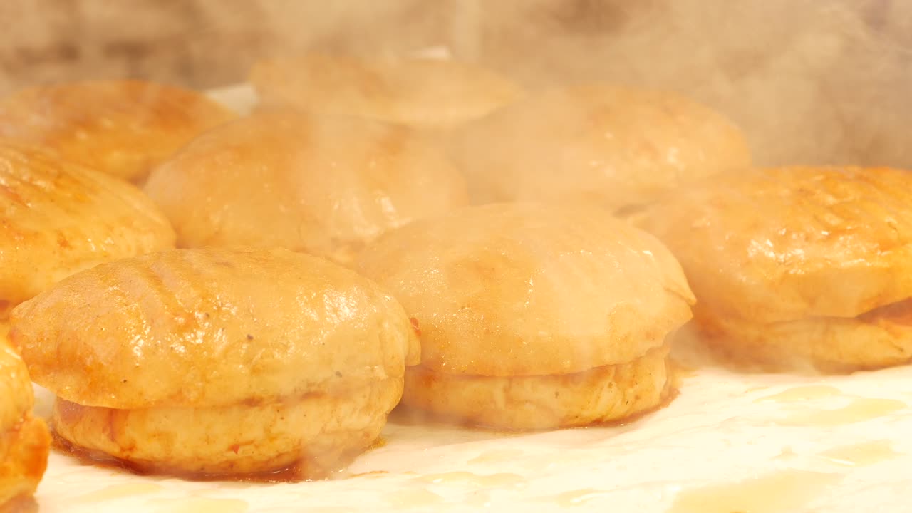 Hot, freshly baked hamburger buns