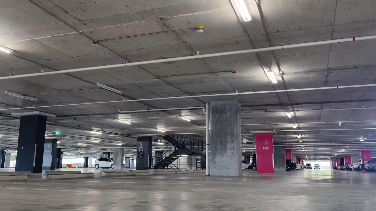 Empty Underground Parking Garage with Cars