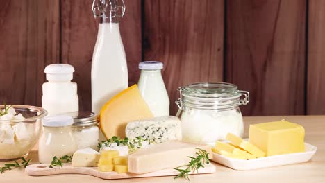 assorted dairy items displayed on wooden surface