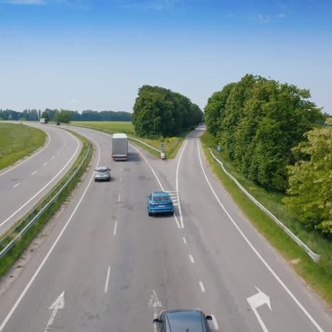 Blue modern car driving throw the road. Flight over the automobile driving