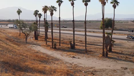 interstate 10 highway in coachella valley barren desert landscape, california