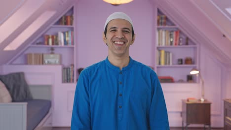 Happy-Muslim-man-laughing-on-someone