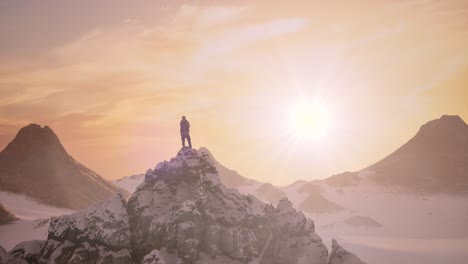 adventurous man hiker on a snowy peak