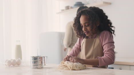 mother and daughter baking together