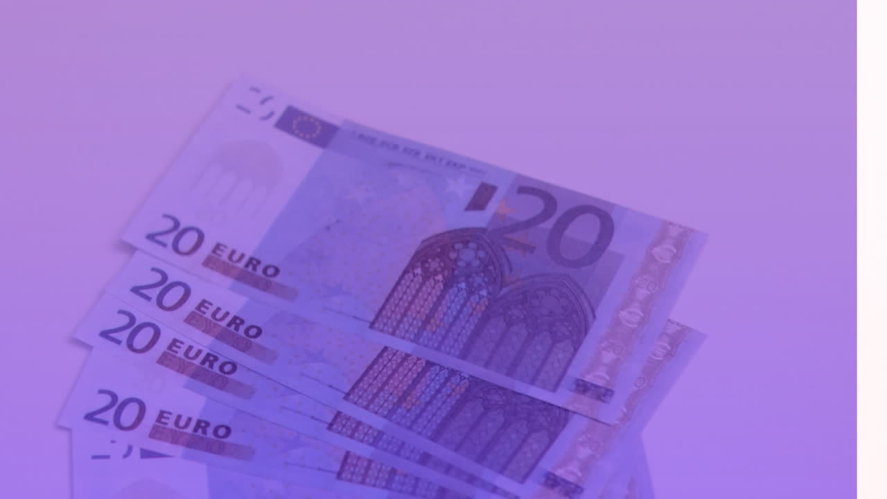 animación de primer plano de billetes de euro que vuelan contra un fondo púrpura.
