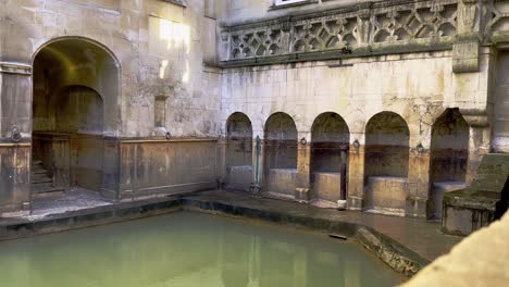 steam rising from the naturally heated roman springs at bath england