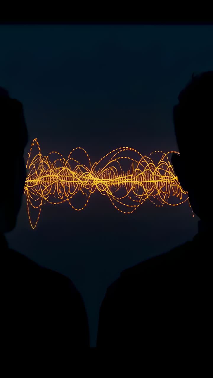 Vertical video: Watching two silhouettes studying waveform activating in dark room, in casual tops