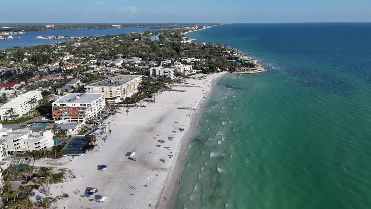 white sugar sand beaches and coastal properties along the full southern coastline of famous Siesta Key island beach near south Sarasota, Florida