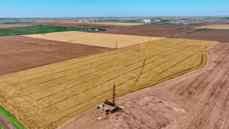 distancing from the little location with oil production in the vast field. rising up over the area for drilling natural resources.