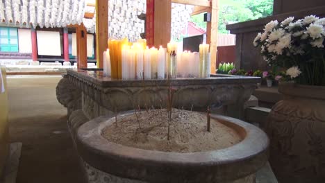 incense burning in a buddhist temple in seoul, south korea