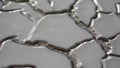 close up of a gray tile mosaic pattern