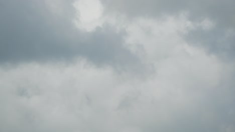 dynamic timelapse of swiftly moving clouds on a bright sunny day, ideal for depicting changing weather