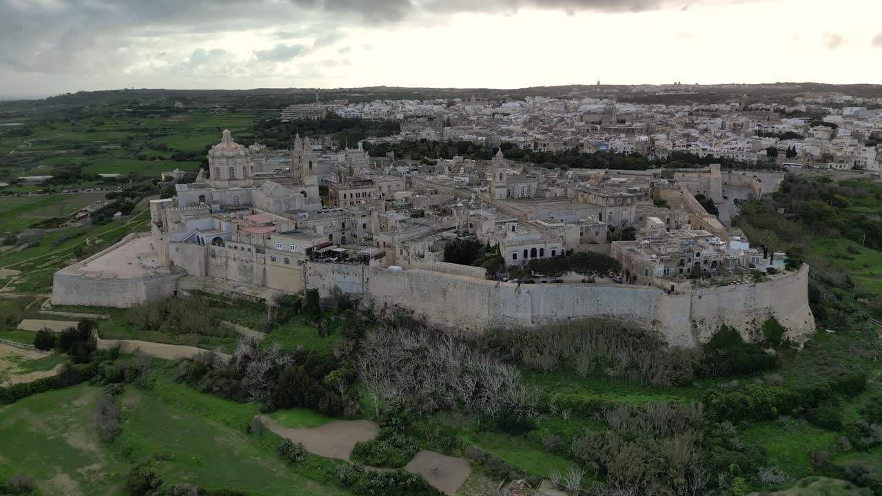 Drone Video Panning to the Right Around Mdina in Malta on a Cloudy Day