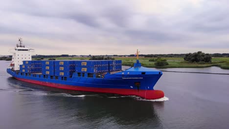 tailwind panda container ship on the dutch canal in the netherlands