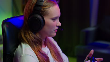 young woman playing video games