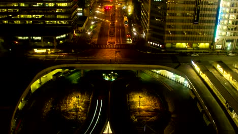 night lapse at shinjuku station west side wide shot high angle left panning