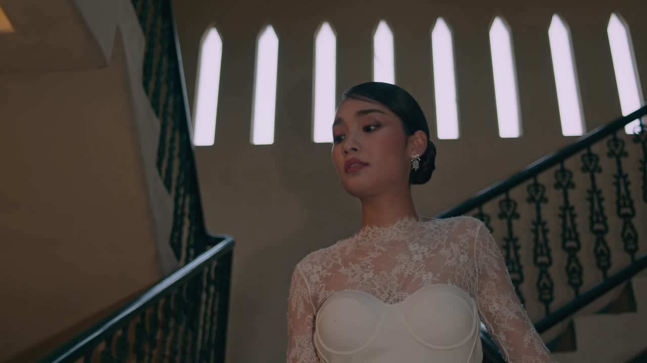 Elegant Bride on a Staircase