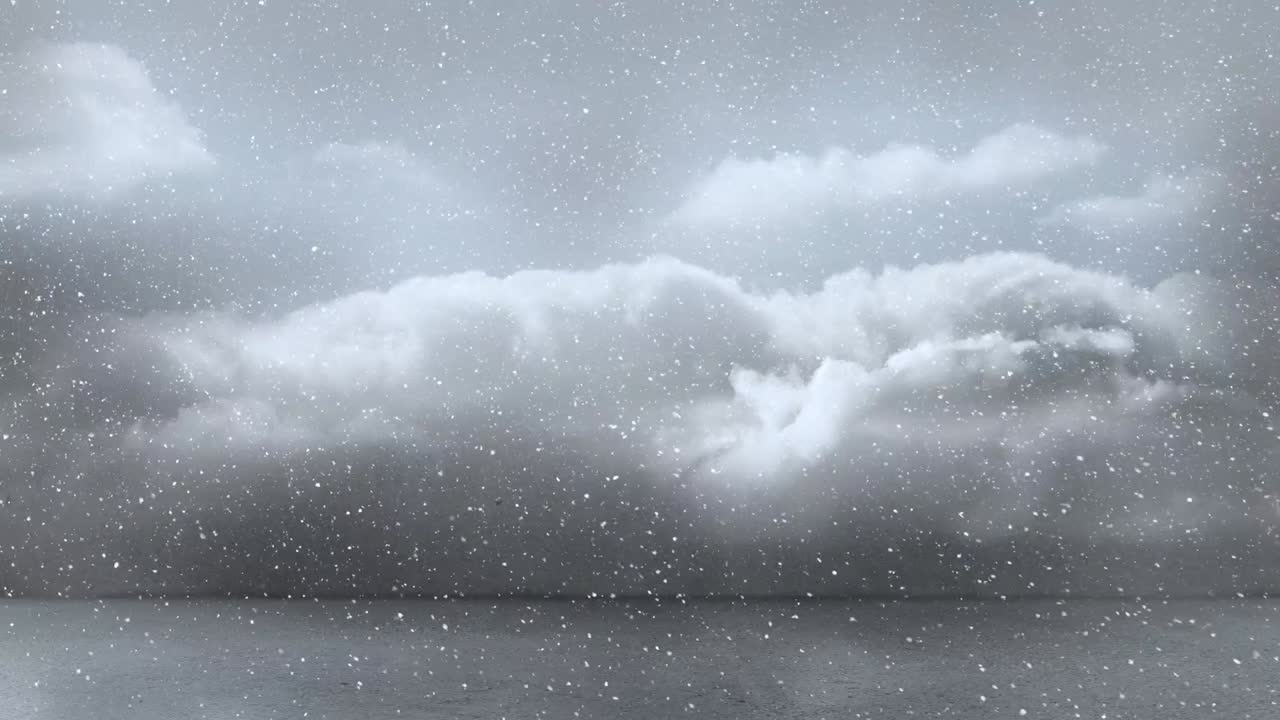 クリスマスの雲空に雪が降るアニメーション