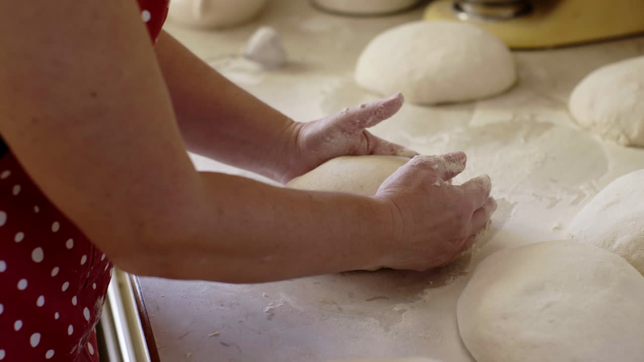 Woman Kneading Dough for Homemade Bread