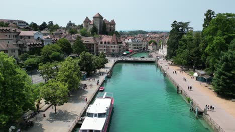 Boats-moored-at-quayside-Annecy-city-France-drone-,-aerial,-4K-footage