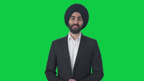 Happy-Sikh-Indian-businessman-smiling-Green-screen