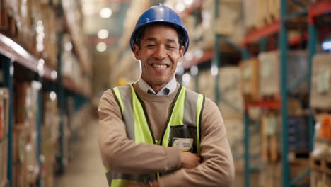 warehouse worker smiling in warehouse