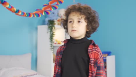 in his room at home, the child feels bored and unhappy.