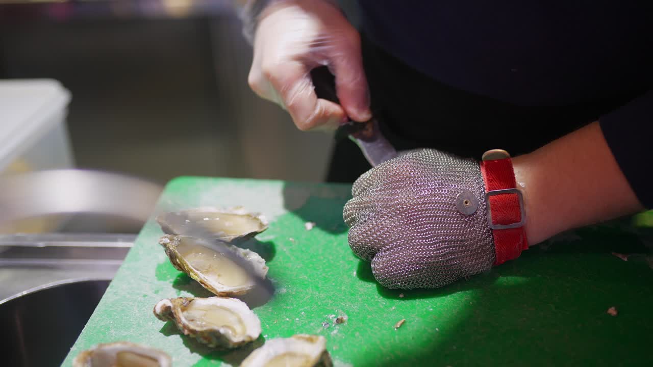 Chef preparing oysters