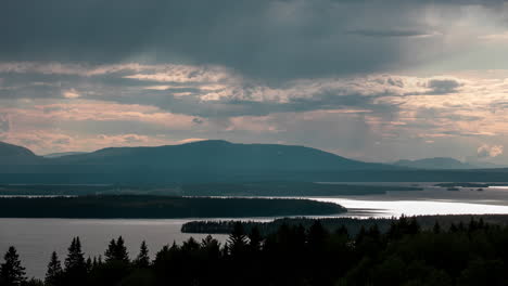 mountain view over lake with sunstrokes in sweden