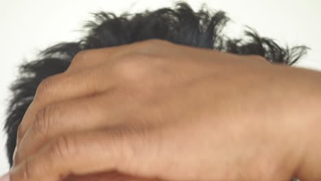 close-up shot of a man's black hair