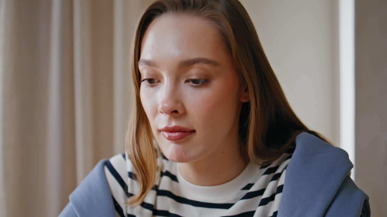 Portrait attractive woman nodding at work meeting. Professional communicate