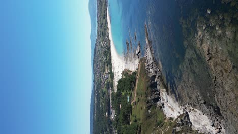 Vertical-of-Sanxenxo-scenic-coastline,-Beautiful-beaches-and-turquoise-seascape,-Galiza