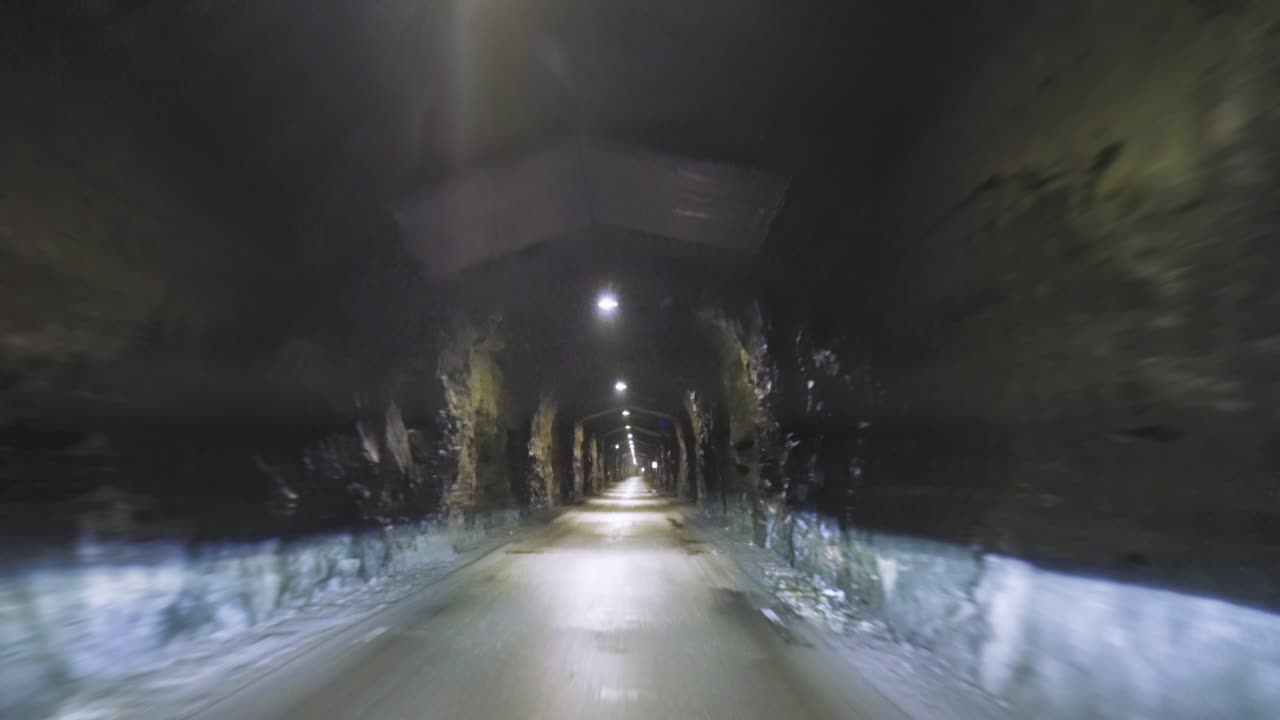 Drive through a narrow Bakka tunnel from Gudvangen to Dyrdal