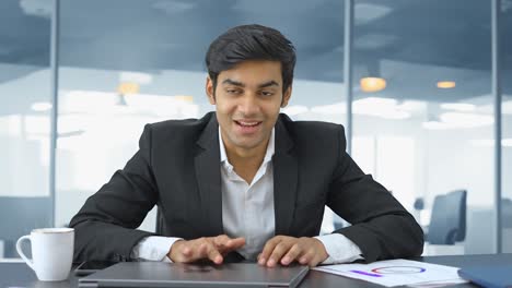 happy indian manager appreciating employees