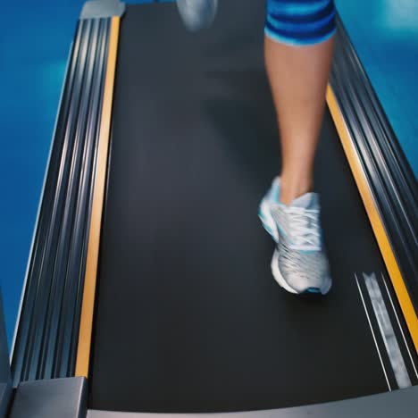 Runner's-legs-on-the-treadmill-close-up