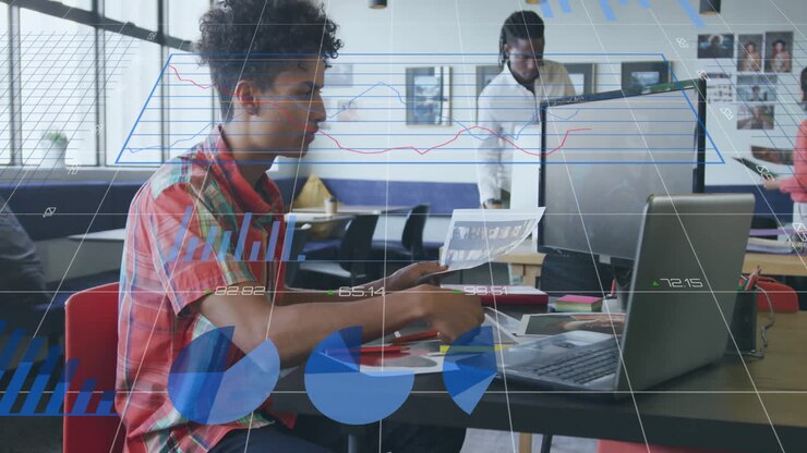 Animation of financial data processing over biracial businessman in office