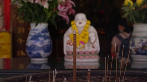 Close-up-view-of-incense-burning-in-a-local-Chinese-Temple