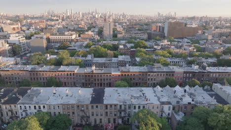aerial view of new york city brownstones and skyline