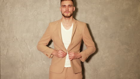 man in beige suit