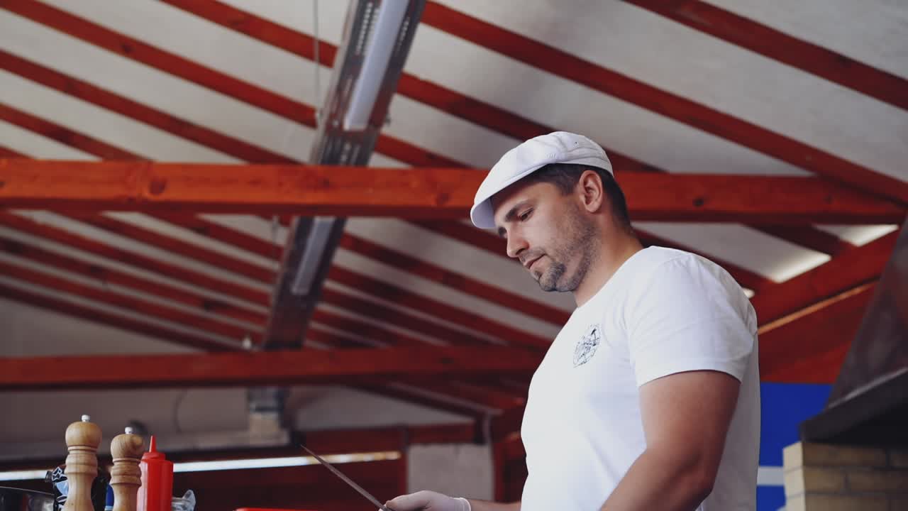 Chef cooking at restaurant. Chef in restaurant kitchen cooking food