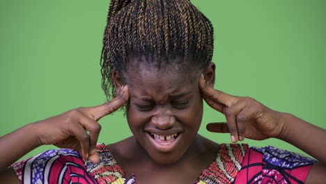 young african woman having headache