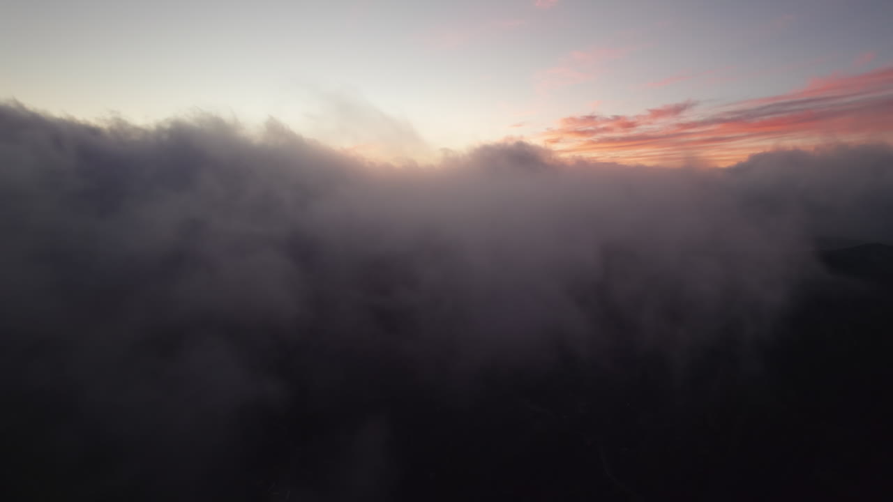Sun rising above a sea of clouds over Gran Canaria