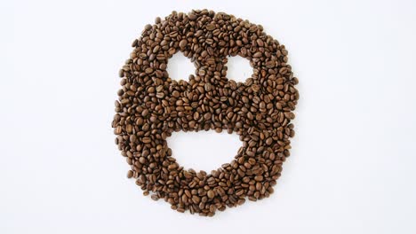 coffee beans forming smiley face