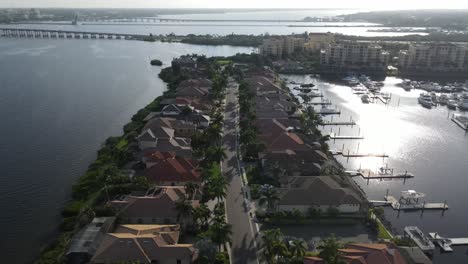 aerial floating down luxury housing community on the manatee river, florida