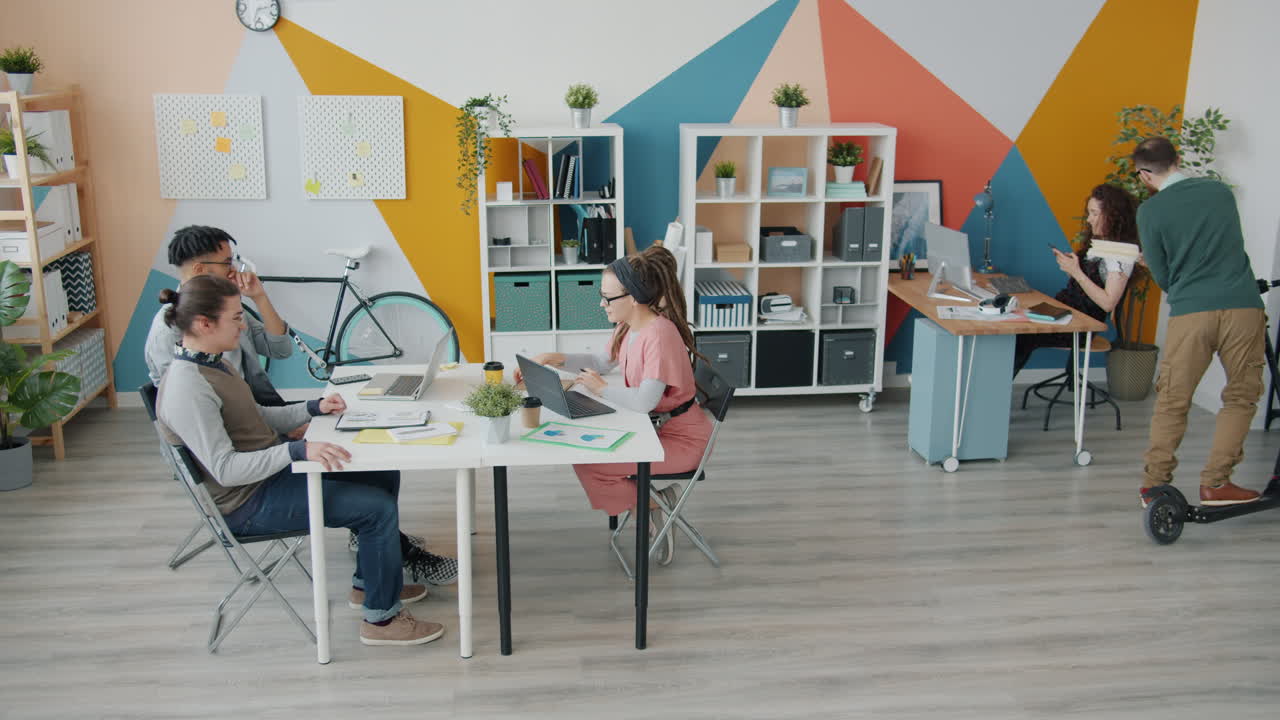 Modern Office Workspace with Diverse Team