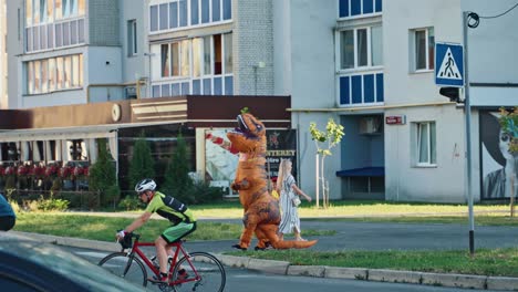 Dinosaur costume on street. Person dressed dinosaur, walking in city